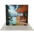 Center view of 10ft Firefly Lightbox highlighting bright edge lighting and scenic cabin backdrop for booth or event display use.