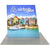 Center view of 8ft Angled Firefly Lightbox with vibrant waterfront design and soft even lighting, designed for professional booth or exhibit branding.