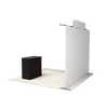 Rear angled view of trade show display showing fabric backing, frame structure, overhead lighting, attached header panel, and podium backside.