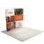 Left angle view of curved trade show backdrop displayed within booth space to show depth.