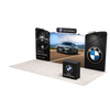 Right-front angle highlighting the dimensional booth layout, double-sided graphics, four overhead LED lights, and visitor-facing presentation.