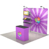 Fabric display wall with monitor mount and counter, ideal for trade show presentations.
