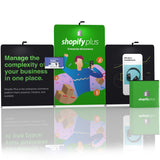 20ft QuickZip Monument Display featuring a tall centre tower with flanking fabric panels and matching counter for trade shows.