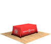 Angled left view of 6ft printed table throw showing smooth tabletop fit and flowing side panels.