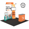 8ft QuickZip Max Curved trade show display with reversible flooring alternating between black and grey carpet style tiles. 