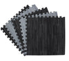 Interlocking 10x10 Reversible Wood Tiles in black and grey finishes, featuring durable foam construction and wood grain texture for trade show or event flooring.