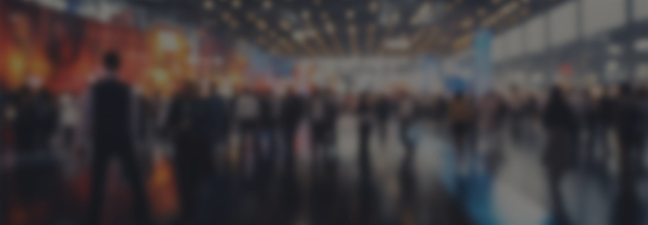 Background image of people at a busy tradeshow